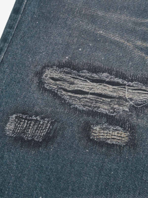 Charm print ripped jeans – rips close-up | XoKool