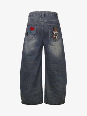Cartoon Patch Barrel Jeans in Vintage Wash – back view | XoKool
