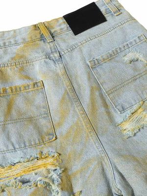 Jorts cargo rotos con efecto lavado sucio – detalle de los bolsillos traseros y el parche | XoKool