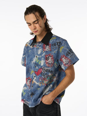 Short Sleeve Graffiti Print Denim Shirt – on model, 3/4 front | XoKool