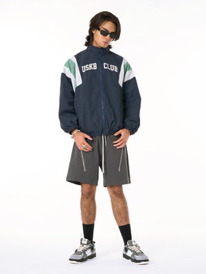 Color block windbreaker – Navy on model, full length | XoKool
