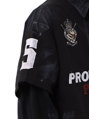 Polo en capas – detalle de la manga y el escudo | XoKool