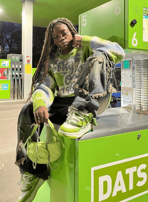 Green canvas sneakers – street photo on model (woman) | XoKool