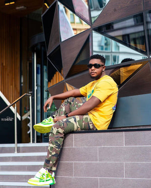 Green canvas sneakers – street photo on model (man) | XoKool