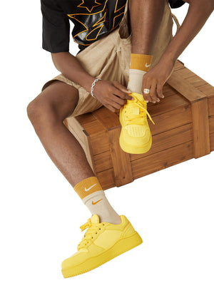 Yellow Chunky Low Top Sneakers with Tonal Overlays – on model, yellow, lacing | XoKool