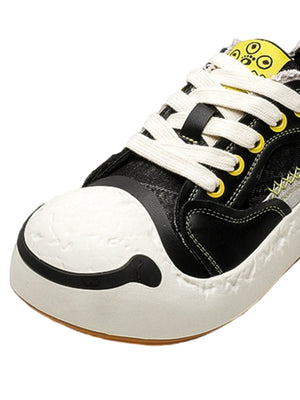 Black and Yellow Big Toe Sneakers with Frayed Collar – Black toe close-up | XoKool