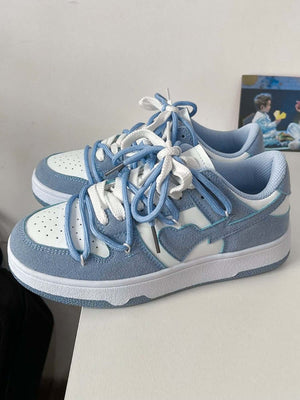 Light blue heart sneakers – pair on table | XoKool