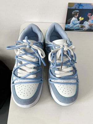 Light blue heart sneakers – pair on table, top | XoKool