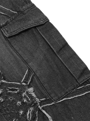 Schwarze Cargo Jeans mit Spinnennetz – Cargotasche im Detail | XoKool