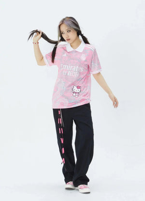 Show off your love for Real Madrid and Hello Kitty with our Dragon Jersey! Made with high-quality materials for maximum comfort and durability. Perfect for any fan or collector, this jersey showcases unique design elements that make it truly one-of-a-kind
