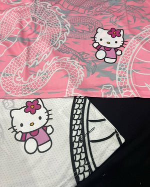 Show off your love for Real Madrid and Hello Kitty with our Dragon Jersey! Made with high-quality materials for maximum comfort and durability. Perfect for any fan or collector, this jersey showcases unique design elements that make it truly one-of-a-kind