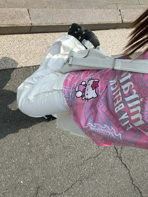 Show off your love for Real Madrid and Hello Kitty with our Dragon Jersey! Made with high-quality materials for maximum comfort and durability. Perfect for any fan or collector, this jersey showcases unique design elements that make it truly one-of-a-kind