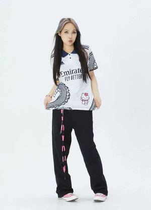 Show off your love for Real Madrid and Hello Kitty with our Dragon Jersey! Made with high-quality materials for maximum comfort and durability. Perfect for any fan or collector, this jersey showcases unique design elements that make it truly one-of-a-kind