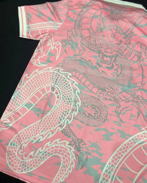 Show off your love for Real Madrid and Hello Kitty with our Dragon Jersey! Made with high-quality materials for maximum comfort and durability. Perfect for any fan or collector, this jersey showcases unique design elements that make it truly one-of-a-kind