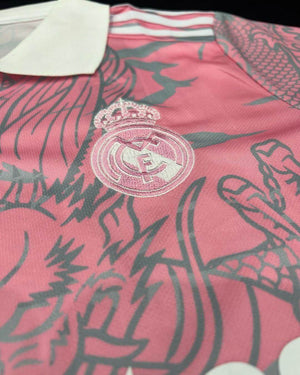 Show off your love for Real Madrid and Hello Kitty with our Dragon Jersey! Made with high-quality materials for maximum comfort and durability. Perfect for any fan or collector, this jersey showcases unique design elements that make it truly one-of-a-kind