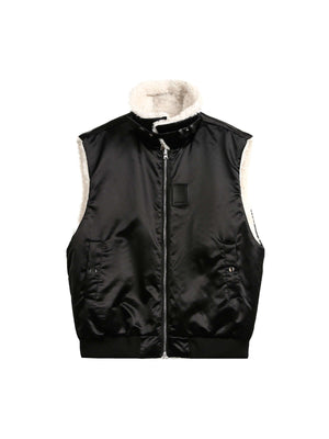 Reversible Wear Sherpa Vest Cozy Two-in-One Style Stay versatile with the Reversible Wear Sherpa Vest. Designed for comfort and style, this two-in-one piece features a cozy sherpa side and a sleek reverse for any look. Key Features: Material: Soft Sherpa