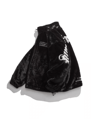 Make a bold impression with the Street Letter Embroidered Fleece Jacket. Crafted from ultra-soft faux fur, this oversized winter essential combines warmth, comfort, and eye-catching streetwear design. The jacket features bold embroidered text across the b