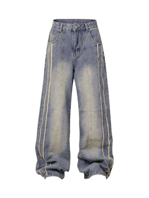 Upgrade your streetwear look with the Washed Distressed Raw Edge Baggy Jeans. Crafted from durable denim, these jeans feature a loose, relaxed fit with stylish side stripes and a raw edge finish for a bold, modern vibe. The elastic waistband ensures all-d