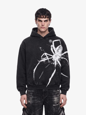 Acid Wash Black Hoodie with Painted Spider Graphic – on model, front | XoKool