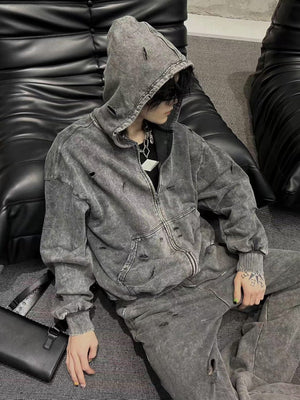 Acid wash zip up hoodie – on model, sitting | XoKool