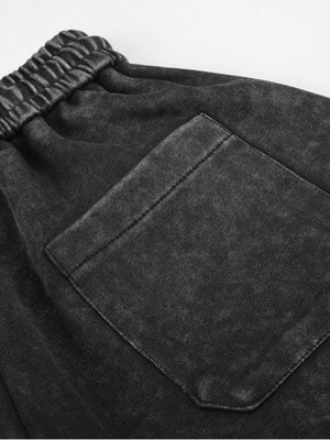 Pantalones deportivos acid wash – detalle del bolsillo trasero | XoKool