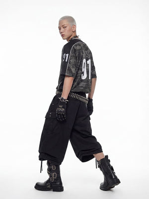 Baggy Pleated Cargo Shorts with Drawstring Hems – on model, side | XoKool