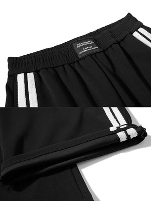 Star track pants – Black waistband and stripe close-up | XoKool