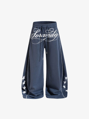 Baggy Trainingshose mit Schriftzug- und Stern-Print – Schieferblau, Vorderseite flach | XoKool
