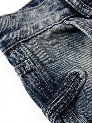 Dirty wash barrel jeans – front pocket close-up | XoKool
