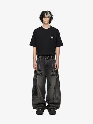 Black ripped barrel jeans – on model, full front | XoKool