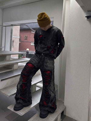 Schwarze Shredded Jeans – Lifestyle, auf der Treppe | XoKool