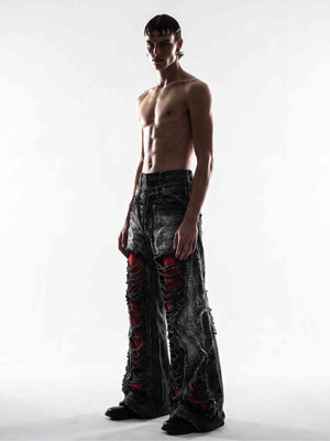 Black Ripped Jeans with Red Mesh Underlay – on model, 3/4 | XoKool