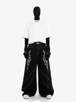 Black Tribal Jeans with White Embroidery – on model, front | XoKool