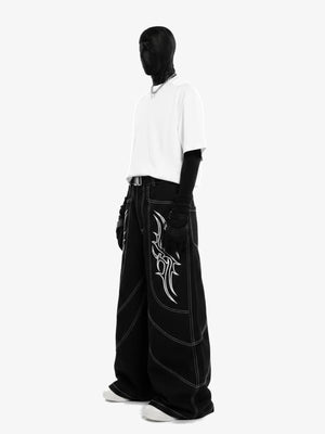 Black Tribal Jeans with White Embroidery – on model, side | XoKool