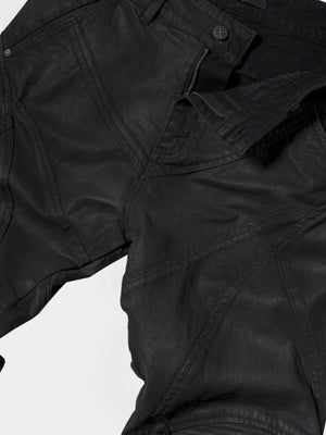 Black waxed jeans – front panel close-up | XoKool