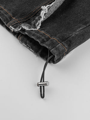 Black frayed jeans – drawstring toggle close-up | XoKool