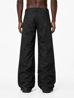 Schwarze Wide Leg Jeans mit Knie-Patches – am Model, Rückseite | XoKool