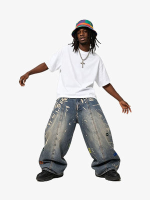 Bleached graffiti jeans – on model, wide stance | XoKool