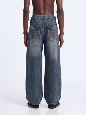Blue Barrel Jeans with Studded Strap Tabs – on model, back | XoKool