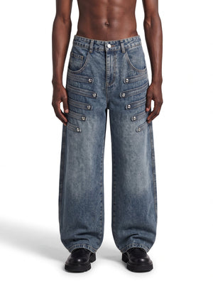 Blue Barrel Jeans with Studded Strap Tabs – on model, front | XoKool