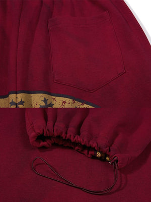 Back Graphic Sweatpants – Red back pocket and hem close-up | XoKool