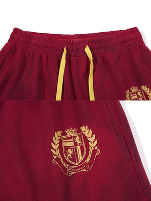 Back Graphic Sweatpants – Red waist and crest close-up | XoKool