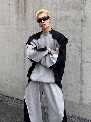 Conjunto de sudadera cuello redondo color block y pantalones deportivos de pierna ancha – en modelo, frente, en la calle | XoKool