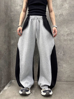 Conjunto deportivo color block – en modelo, pantalones de frente | XoKool