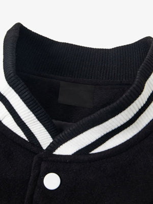 Colorblock Varsity Jacket with Leather-Look Sleeves – Black / White, collar close-up | XoKool