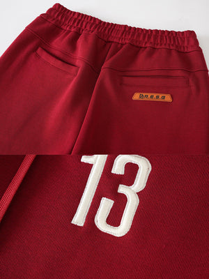 Contrast Panel Sweatpants – back pocket and 13 embroidery close-up | XoKool