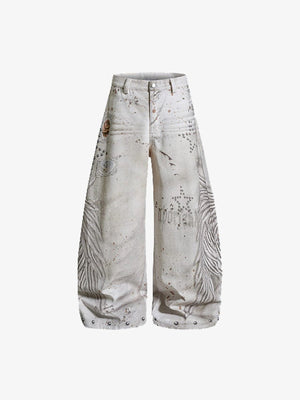 Jeans crema con estrella de tachas y salpicaduras de pintura – vista frontal en plano | XoKool