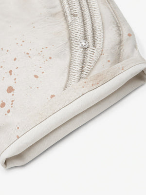 Jeans crema – detalle del bordado en el bajo | XoKool