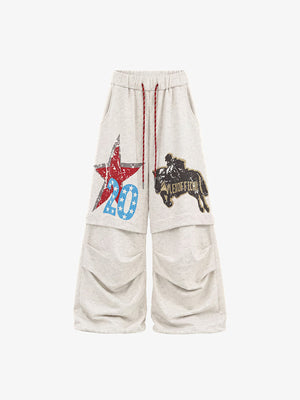 Pantalones deportivos crema con gráficos de estrella y rodeo – Avena, vista frontal | XoKool