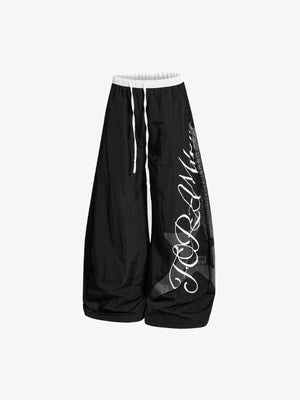Knitter-Fallschirmhose mit Stern-Print – Schwarz, Vorderansicht | XoKool